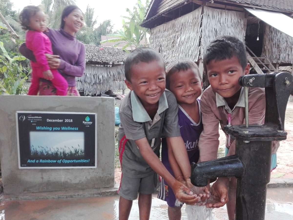 Cambodian children are thrilled to easily access fresh water for the first time thanks to a well donated by Mark & Trina Ramsey Foundation!