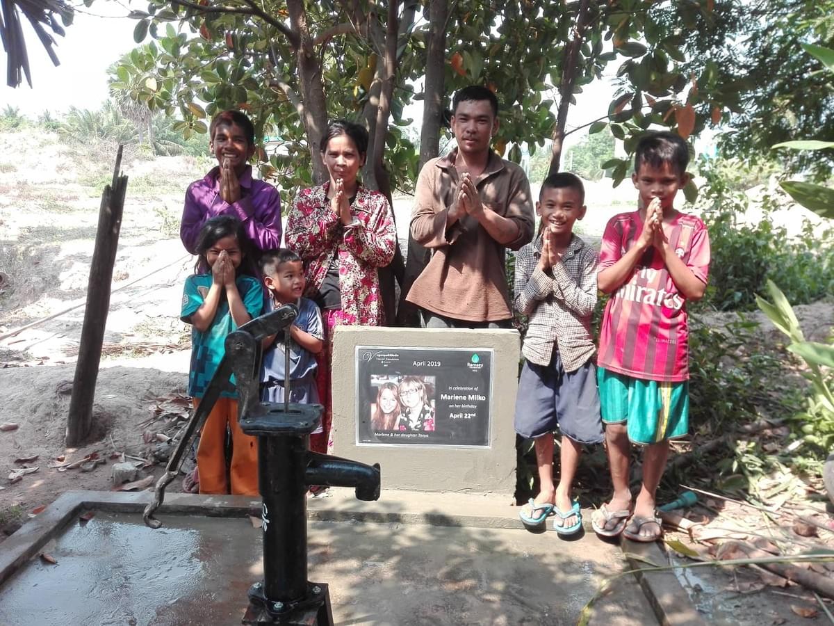 A very grateful Cambodian family benefitting from a generous donation that resulted in a surprise birthday dedication!