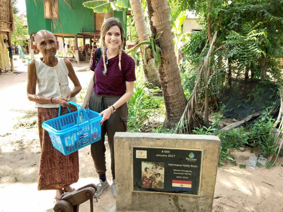 Visiting one of the Cambodian family members that benefit from the water well that her mother, Lisa Ross, donated in recognition of Holly's missionary work in Paraguay.