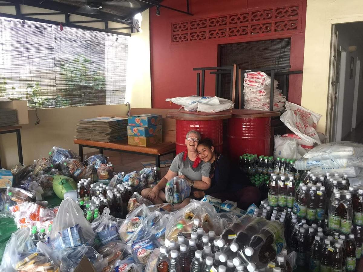 Jill Morse, from our partner, RSSO, and one of their volunteers surrounded by a sea of food items they're aseembling into care packages to be donated to Cambodians in need...clearly al labor of love!