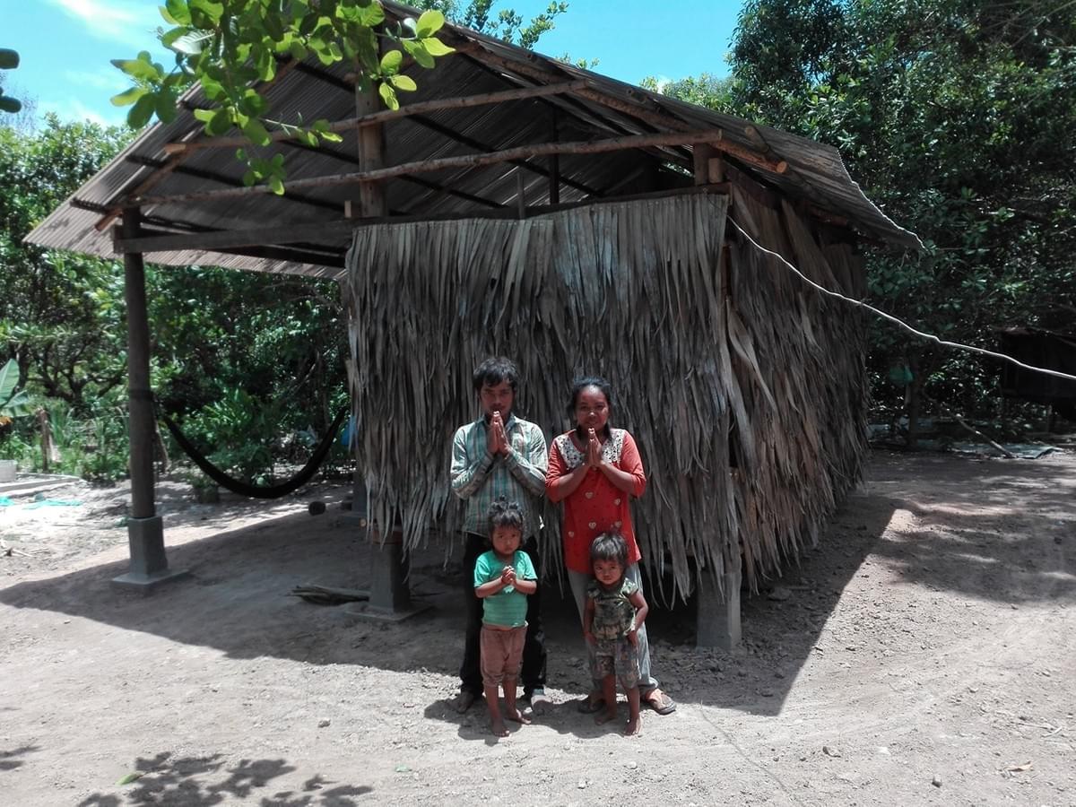 Materials for this home, constructed by the pictured Cambodian family & their friends/family,  were donated by Jennifer Mars.