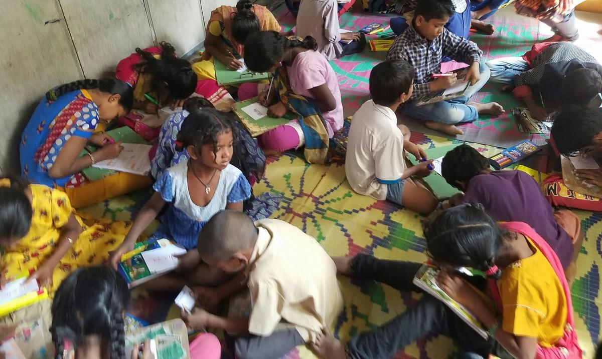 Putting school supplies donated by Mark & Trina Ramsey Foundation to good use in India