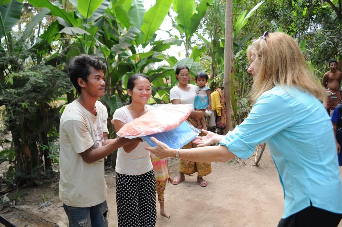Mosquito Nets being donated to Cambodian families by the Mark & Trina Ramsey Foundation Mosquito Nets being donated to Cambodian families by the Mark & Trina Ramsey Foundation